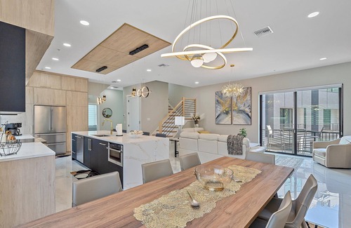 Downtown Casa | Luxury 3BR Townhouse w/Elevator & Rooftop | Walk to Downtown