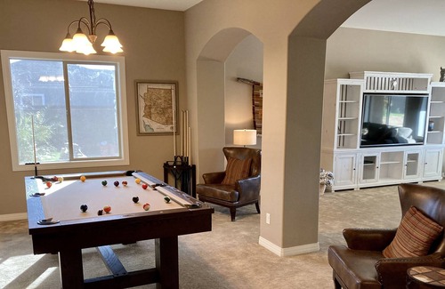 Queen Creek Casa | Luxury 4 BR, pool/spa w/ swim up bar, mist system, putting greens, pool table.
