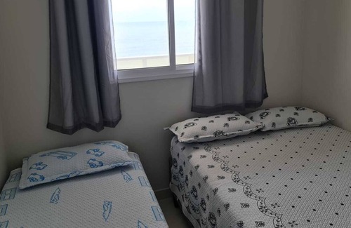 Praia do Morro Apartamento | Apartamento de lujo, frente a la playa, 3 suites, 2 espacios de garaje