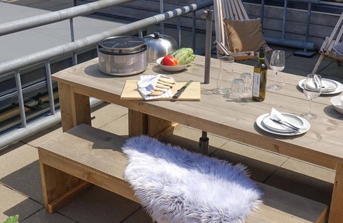Stellendam Casa | Luxury apartment with private terrace, spacious living room, and stunning views of the marina.