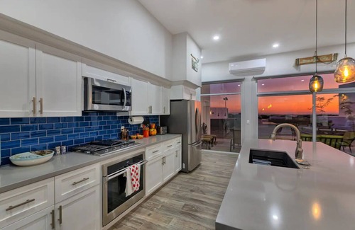 Laguna Shores Casa | Luxury Beachfront Oceanview 4 Bed Home in Laguna Shores Pools Pickleball Kayaks