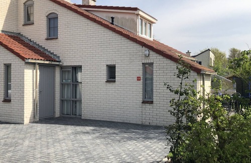 De Cocksdorp Casa | Luxury Bungalow for 2-6 people with fireplace in vacation park with swimming pool.