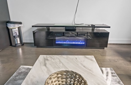 Riverside Terrace Casa | Luxury Condo Downtown + Neon Photowall