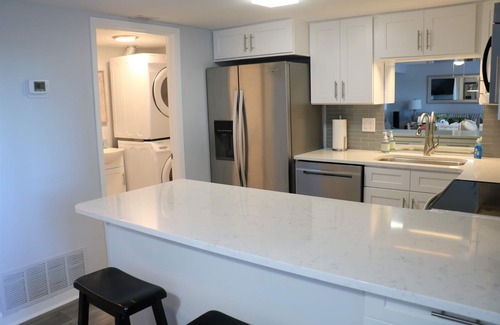 Sunnyside Condominio | Hermoso condominio frente a la playa de Pinnacle Port, completamente renovado # A339