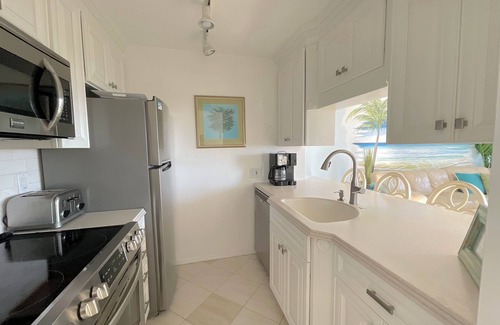 North Ocean City Condominio | Preciosa unidad frente al mar, ideal para familias, con un balcón privado de 1000 pies cuadrados