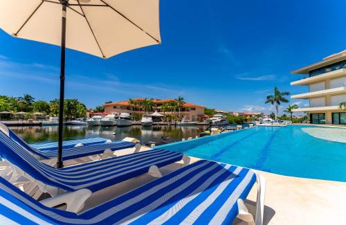 Puerto Aventuras Apartamento | Luxury Ground Floor MarinaView-Pool-Gym-Paddleboard