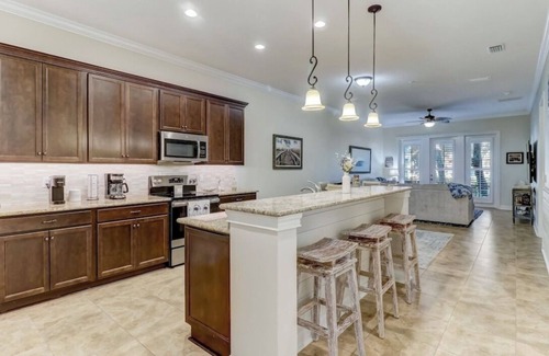 American Beach Condominio | Luxury ground level condo. Golf cart, bikes, included.
