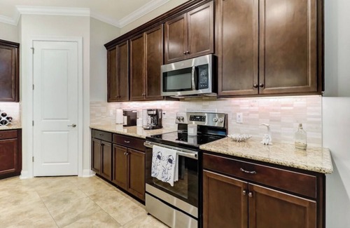American Beach Condominio | Luxury ground level condo. Golf cart, bikes, included.