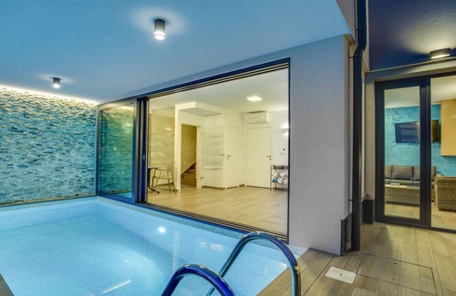 Zurkovo Villa | villa piscina lujo que sólo unos pasos de mar Adriático con una vista al mar panorámica