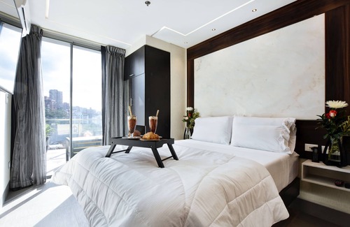 El Poblado Hotel | Habitación de lujo con vistas increíbles y balcón