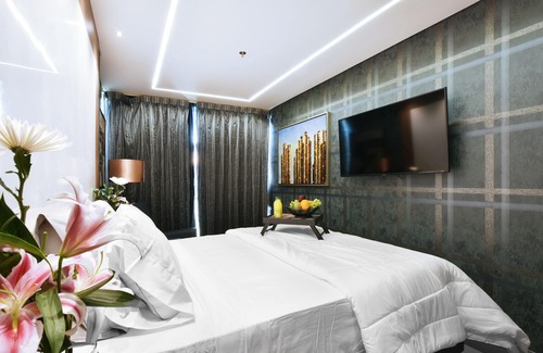 El Poblado Hotel | Habitación de lujo con ventana
