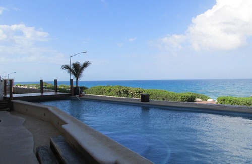 Isla Mujeres Condominio | Lujo de dos dormitorios condominio frente al mar en la Isla 33