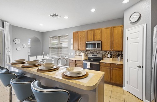 Trafalgar Village Villa | Lux 4BRVilla w/ Hot Tub&Grill -Private Heated Pool