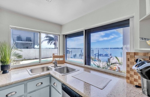 St. Petersburg - Clearwater Casa | Luxury Waterfront Farmhouse Retreat w/Saltwater Pool, Dock & Tiki Bar