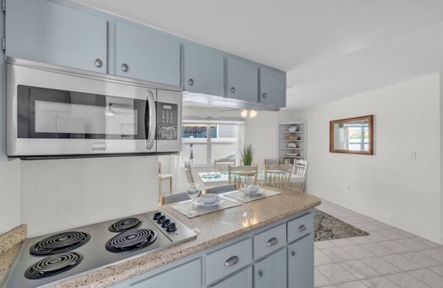 St. Petersburg - Clearwater Casa | Luxury Waterfront Farmhouse Retreat w/Saltwater Pool, Dock & Tiki Bar