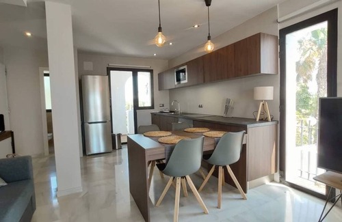 Pueblo Nuevo Condominio | Magnigico dúplex en urb. Jardines de Sotogrande.