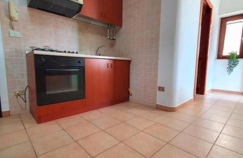 Margherita di Savoia Apartamento | Magnificent Classic Green Apartment for Couples in the Center