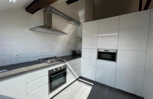 Postel Apartamento | Magnifique duplex situé place Flagey
