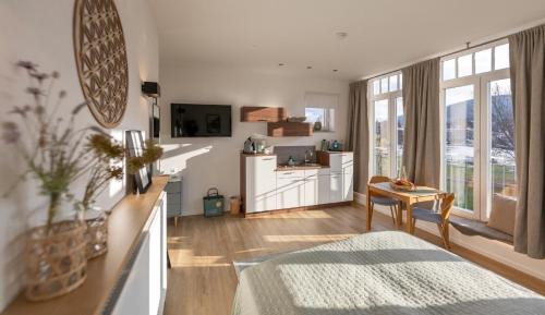 Miltenberg Apartamento | MAINTERRASSE Boardinghouse am Fluss klimatisierte Apartments mit 80qm Terrasse