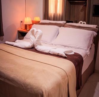 Praia do Morro Apartamento | MAIOR NOTA - 2 Quartos com AR CONDICIONADOS SPLIT, Air Fryer, Wi-Fi, Disney Plus, Star Plus, HBO Max, Guarda Sol, Cadeiras de Praia, Caixa Térmica, Churrasqueira, Rede para Descanso e Chuveirão - 8 pessoas - CONFORTO Máximo - Melhor Localização!