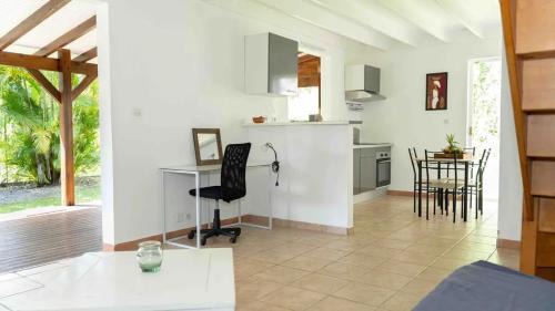 Point d'Or Casa | Maison chaleureuse aux Abymes avec jacuzzi relaxant