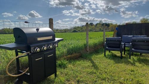 Saint-Seurin-sur-l'Isle Casa | Maison " Pac-Man" climatisée - entre collègues, amis, famille - barbecue - Netflix - Prime - Baby foot 50cts