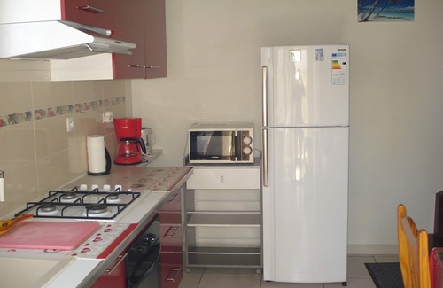 Saint-Pierre Casa | Bungalow con altillo, aire acondicionado, aparcamiento privado cerrado, internet inalámbrico, tranquilo.