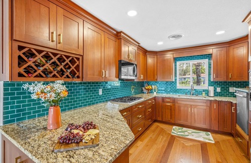 Tropic Casa | Mango Shores: Trendy Riverfront House w/Game Room, Speakeasy & Pool!