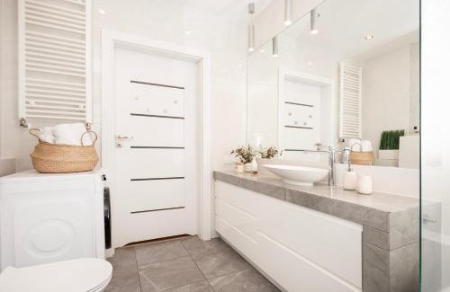 Baluty Apartamento | Manufaktura Residence - Apartament z Garażem Podziemnym i Dwoma Łazienkami