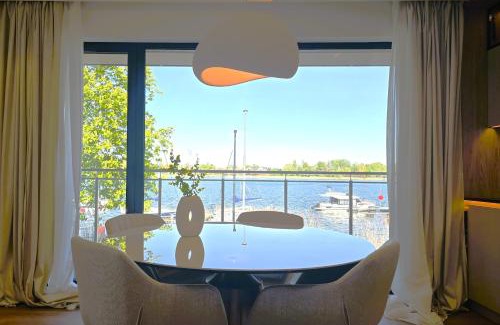 Ostroda Apartamento | Marina Ostróda IV - super widok na jezioro, 10 m do wody, taras i balkon, winda, klima, garaż