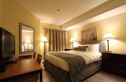 Village North Hotel | Marketplace Lodge #2H7 | Hotel Room with Queen Bed and Balcony
