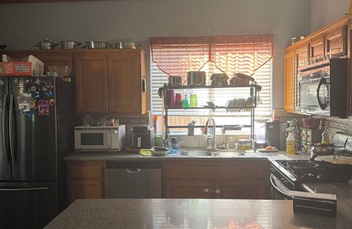 Greenacres Apartamento | Master bedroom with private restroom and private entrance. Two full beds+ futon