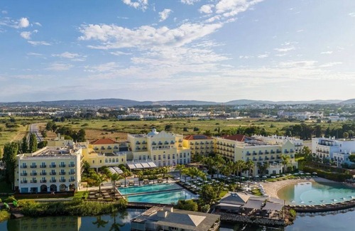 Vilamoura Villa | Masterful Vilamoura Apartment | Apartment Lumiere | 1 Bedroom Suite | Furnished Balcony | Shared Outdoor and Indoor swimming pool | Shared Fitness Centre and Sauna | Common Lounge and Garden | Praia Da Falésia, Apartado Aside