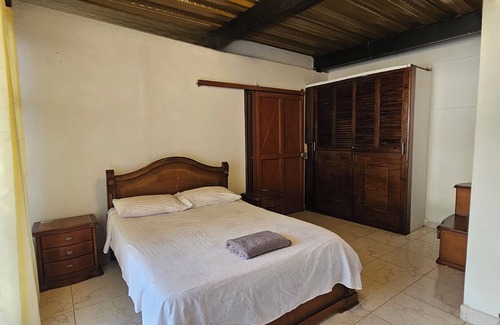 Garzon Cama Y Desayuno | Suite Matrimonial - Zona exclusiva con hamaca frente a la Piscina