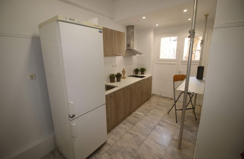 Ilisia Apartamento | Megaron naranja plana