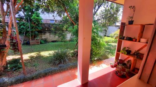 Bacacheri Casa | Memora Guesthouse Curitiba - Quartos em Casa próximo ao Parque Bacacheri
