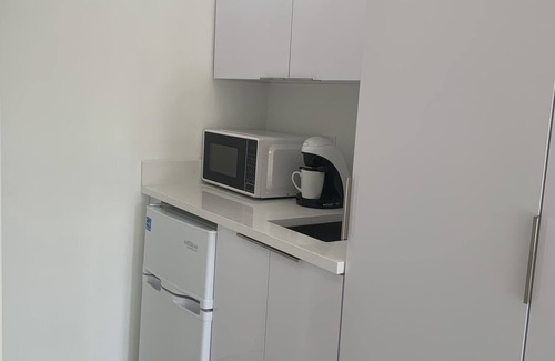 South Middle River Casa | Men Only Clothing Optional Guesthouse near Wilton Manors