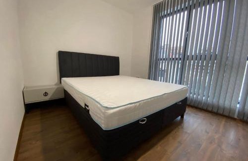 Ixelles Apartamento | Merjay Garden Residence