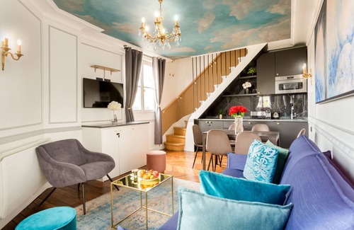 Madeleine Cama Y Desayuno | Merveil Luxury Suites - Royale - Saint Honore view