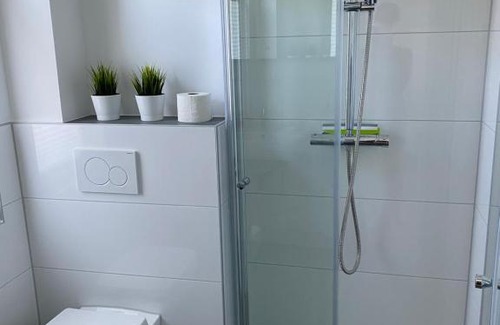 Unterrath Casa | Messezimmer nahe der Düsseldorfer Messe mit eigenem Eingang und gratis Minibar