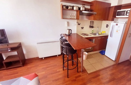 Downtown Santiago Apartamento | Metroapart a pasos del metro La Moneda en el centro de Santiago.