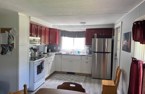 Lake Leelanau Cabaña | Michele’s Landing, Charming cottage in amazing Lake Leelanau, on narrows w/ dock