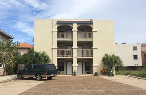 South Padre Island Condominio | Condo fresco y acogedor de Mid-Island con entrada "sin llave" y WiFi gratis