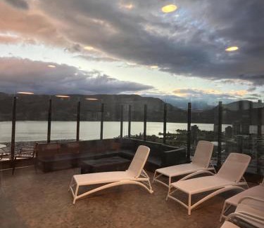Downtown Kelowna Casa | Million-Dollar View 1 bedroom with private bathroom in a shared 2 bed apartment with access to 34th floor lounge in Downtown Kelowna