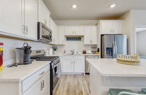 Millville Casa | Millville by the Sea townhome with clubhouse, pools & wellness center access