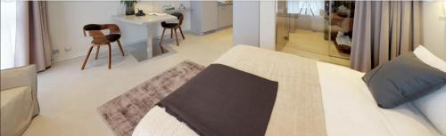 Saint-Sulpice Apartamento | Mini studio avec cuisine, TV mural et sanitaires très confortable