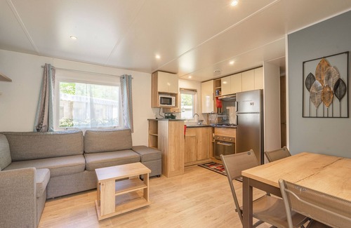 Ronce-les-Bains Alquiler De RV | Mobil Home 'Mh 169 Ronce Les Bains' con piscina compartida, terraza y aire acondicionado