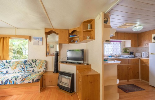 La Tremblade Alquiler De RV | Mobilhome 'Mobilhome Mh343' con piscina compartida, terraza privada y jardín privado