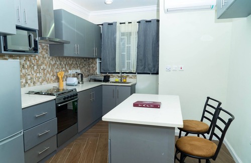 Amrahia Apartamento | Modern 2-Bedroom Apartment Home on a Gated Compound with Backup Solar Power.