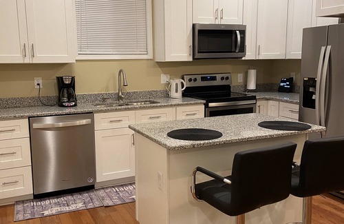 East Durham Casa | Modern 3-bedroom house, TV each room,big fence yard, Pet stay free, Lighted Deck
